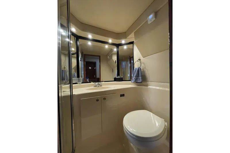 Slide: The Image of Luxurious bathroom in 2008 Meridian 490 Pilothouse yacht, featuring modern fixtures and elegant design. - 22