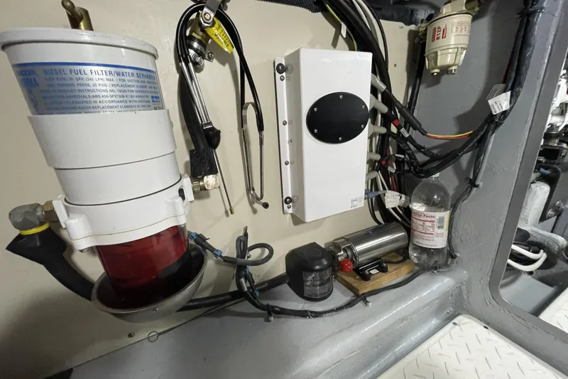 Slide: The Image of Engine room of 2008 Meridian 490 Pilothouse with fuel filter and wiring. - 40