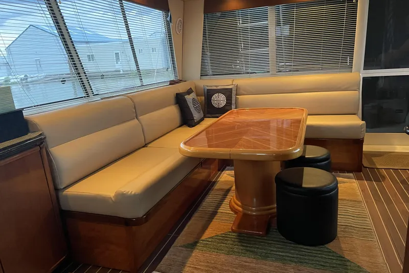 Slide: The Image of Luxurious interior of 2008 Meridian 490 Pilothouse with plush seating and elegant wooden table. - 61