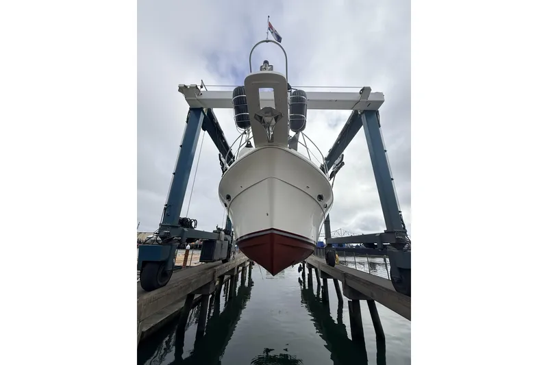 Slide: The Image of 2008 Meridian 490 Pilothouse yacht in dry dock, ready for maintenance. - 66