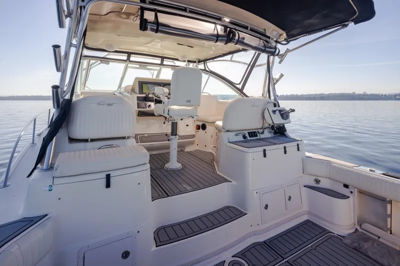 Slide: The Image of 2006 Grady-White Express 360 boat interior with helm, seating, and open water view. - 16