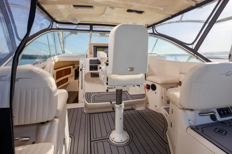 Slide: The Image of 2006 Grady-White Express 360 boat interior with luxurious seating and helm station. - 18