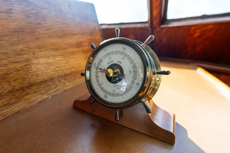 Slide: The Image of Vintage barometer on 1978 Hatteras 53 Yacht Fisherman, wooden interior, nautical theme. - 74