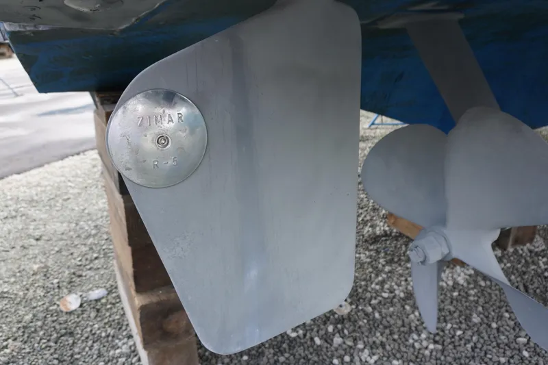 Slide: The Image of 1978 Hatteras 53 Yacht Fisherman rudder and propeller detail with Zimar anode. - 90