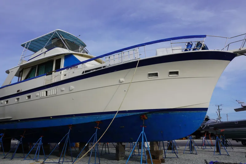 Slide: The Image of 1978 Hatteras 53 Yacht Fisherman on stands, showcasing classic design and structure. - 92