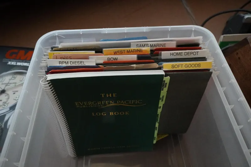 Slide: The Image of Organized boat maintenance files and log book for 1978 Hatteras 53 Yacht Fisherman. - 95