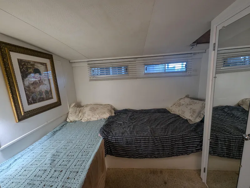 Slide: The Image of Interior cabin of 1965 Pacemaker 53 Motor Yacht with twin beds and framed artwork. - 15