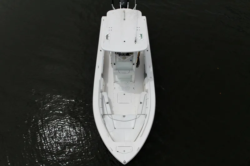 Slide: The Image of Overhead view of 2007 Everglades 243 Center Console boat on dark water. - 10