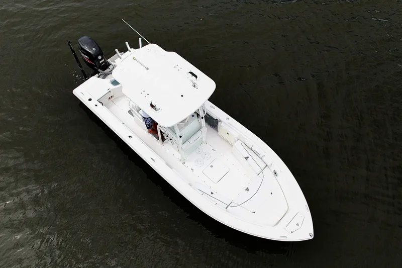 Slide: The Image of 2007 Everglades 243 Center Console boat on water, aerial view. - 11