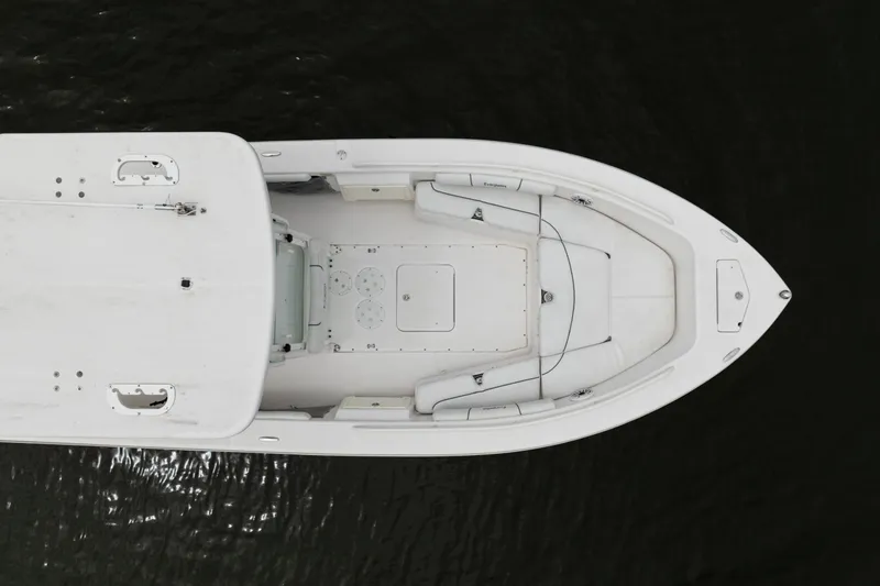Slide: The Image of Overhead view of 2007 Everglades 243 Center Console boat on dark water. - 13