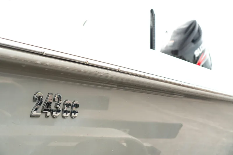 Slide: The Image of Close-up of 2007 Everglades 243 Center Console boat with visible model number. - 17