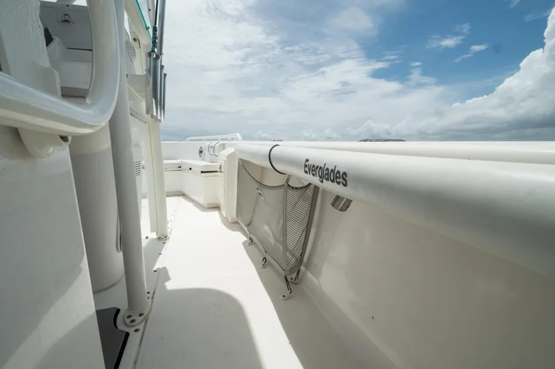 Slide: The Image of 2007 Everglades 243 Center Console boat deck with clear sky background. - 30