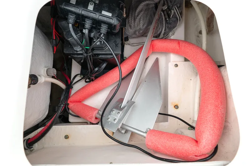 Slide: The Image of Electrical system inside a 2007 Everglades 243 Center Console boat, showcasing wiring and components. - 41