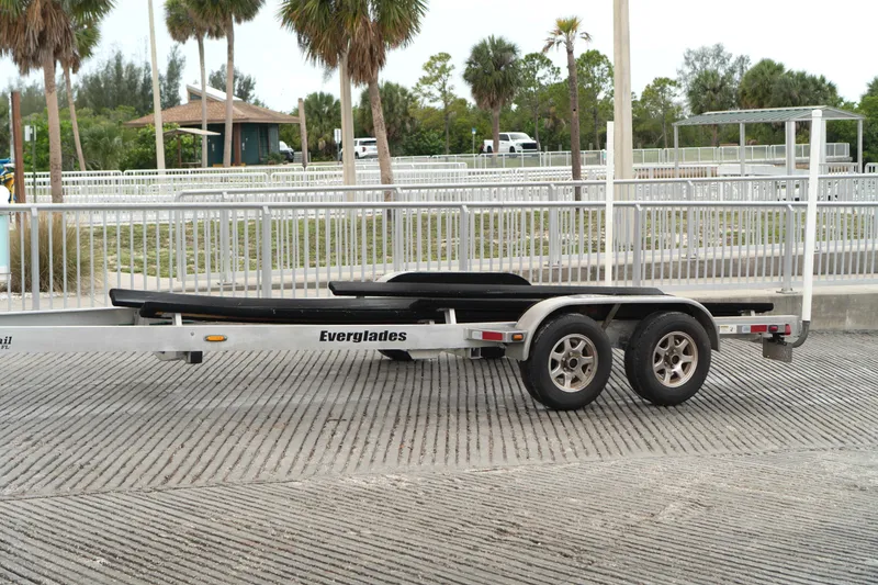 Slide: The Image of Storage compartment of a 2007 Everglades 243 Center Console boat with anchor and wiring. - 42