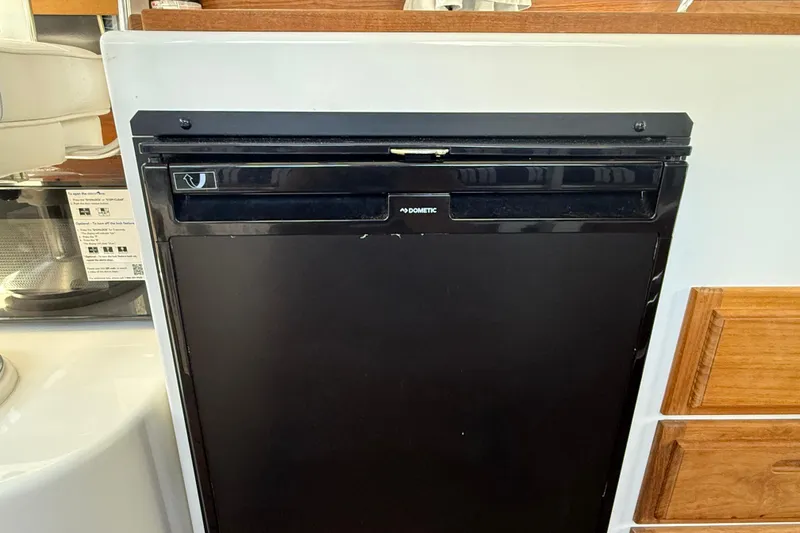Slide: The Image of Dometic refrigerator in 2023 Rosborough 246 Halifax boat interior. - 16