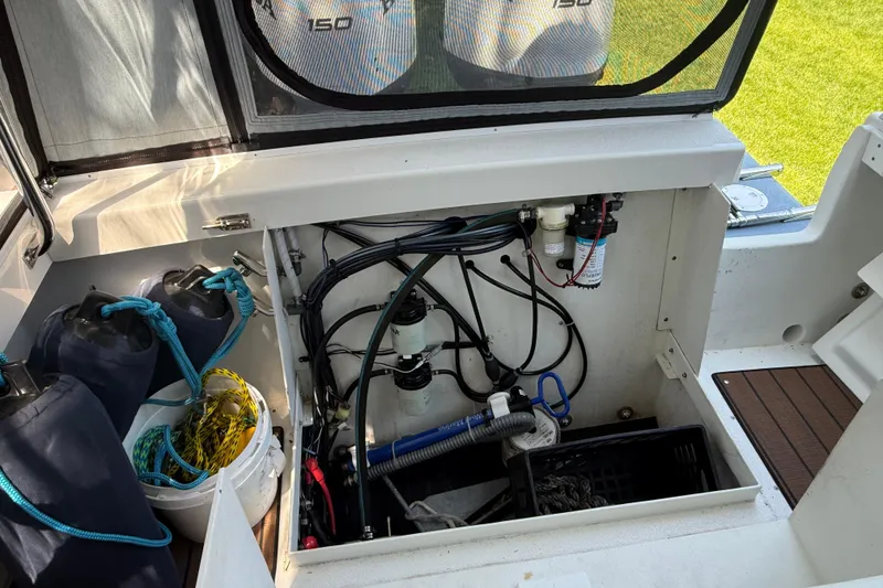 Slide: The Image of 2023 Rosborough 246 Halifax boat interior showing storage and equipment compartment. - 70