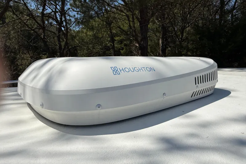 Slide: The Image of Rooftop air conditioning unit on 2023 Rosborough 246 Halifax, surrounded by trees. - 44