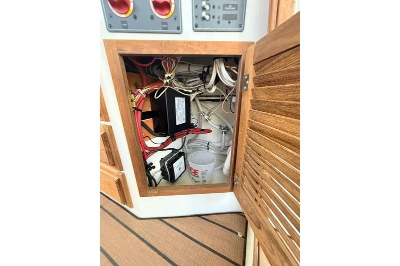 Slide: The Image of Electrical panel inside 2023 Rosborough 246 Halifax boat, showcasing wiring and components. - 75