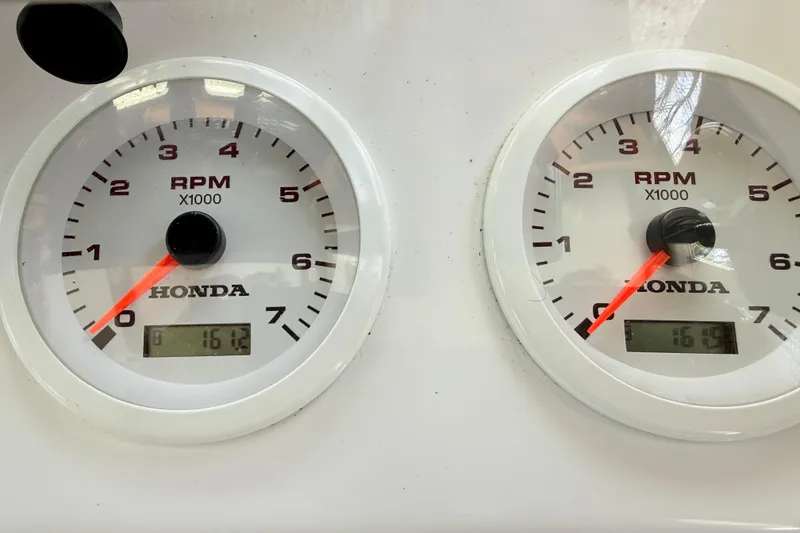 Slide: The Image of Close-up of Honda RPM gauges on a 2023 Rosborough 246 Halifax boat. - 61
