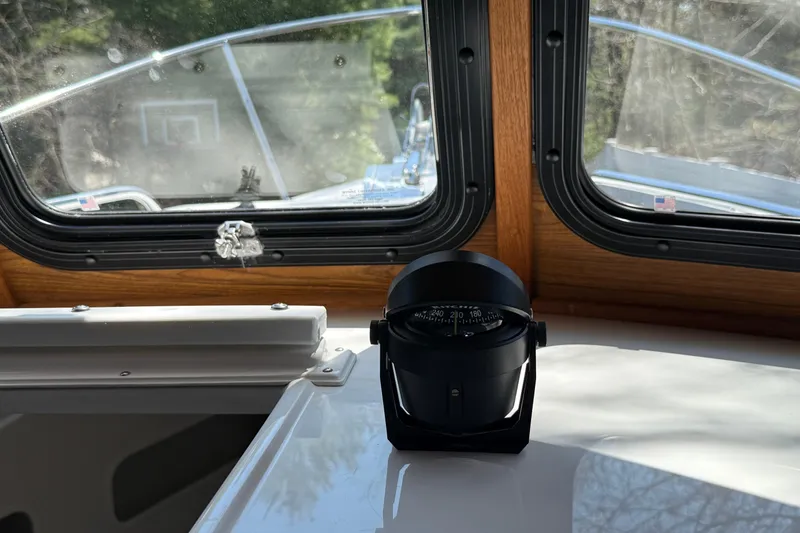 Slide: The Image of Interior view of 2023 Rosborough 246 Halifax boat with compass and windows. - 53