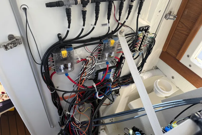 Slide: The Image of Electrical wiring and components inside a 2023 Rosborough 246 Halifax boat. - 27