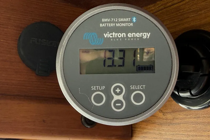 Slide: The Image of Victron Energy battery monitor displaying 13.31 volts on a 2023 Rosborough 246 Halifax. - 62