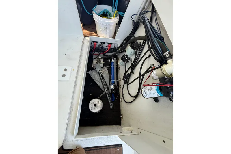 Slide: The Image of 2023 Rosborough 246 Halifax boat interior showing anchor storage and wiring. - 72