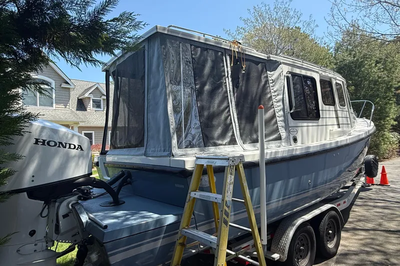 Slide: The Image of 2023 Rosborough 246 Halifax boat on trailer with Honda outboard motor. - 10
