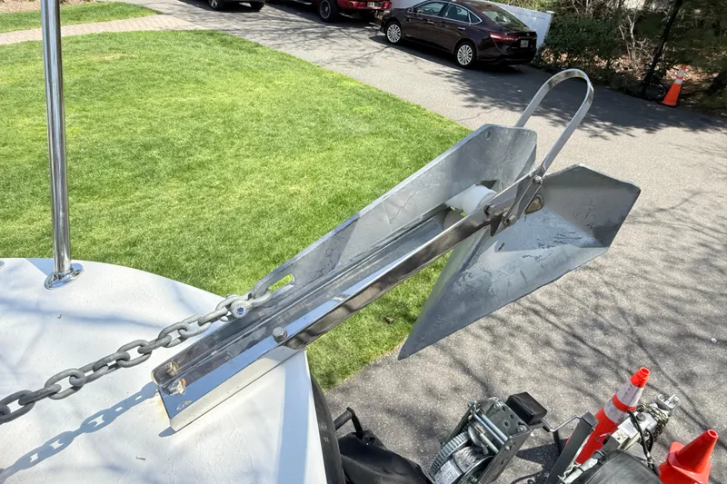 Slide: The Image of Anchor on 2023 Rosborough 246 Halifax boat, parked on a driveway with grass and cars. - 43