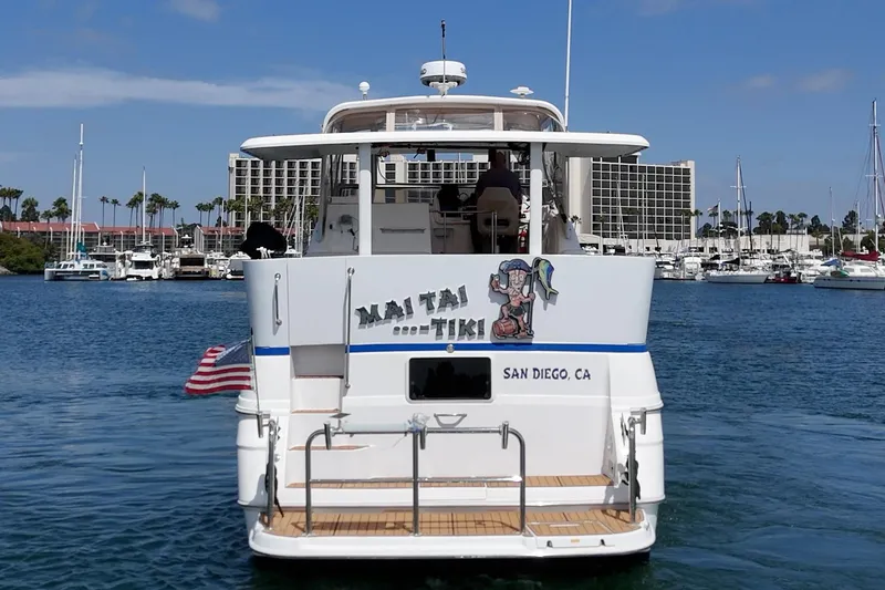 Slide: The Image of 1996 Cruisers Yachts 3650 Aft Cabin in San Diego marina, rear view. - 10