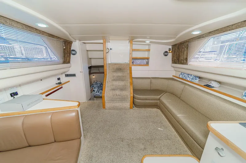 Slide: The Image of Interior of 1996 Cruisers Yachts 3650 Aft Cabin, featuring spacious seating and modern design. - 32