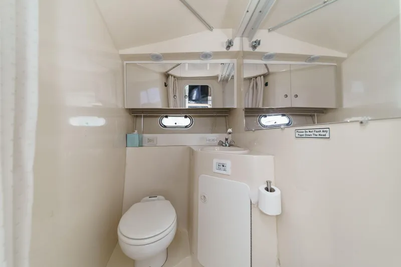 Slide: The Image of Bathroom interior of 1996 Cruisers Yachts 3650 Aft Cabin with toilet and sink. - 48