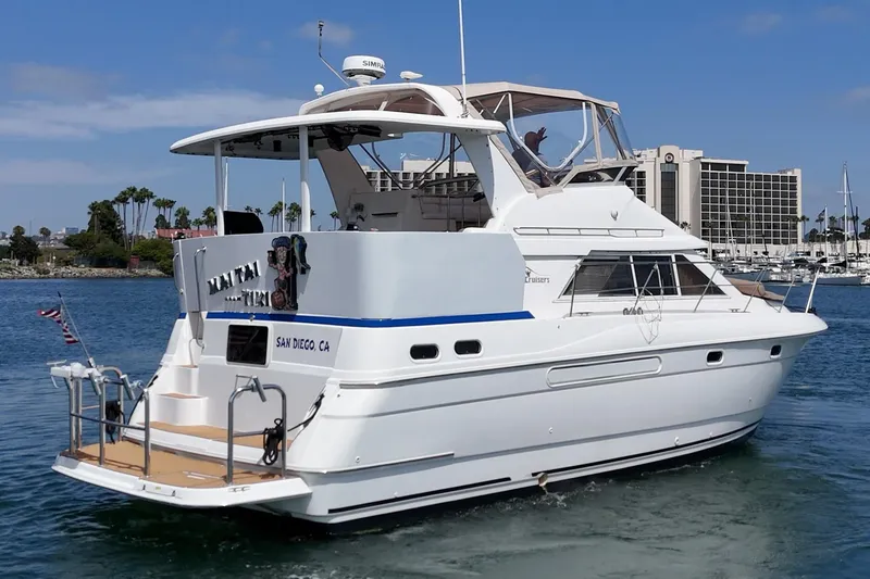 Slide: The Image of 1996 Cruisers Yachts 3650 Aft Cabin in San Diego marina, sunny day. - 9