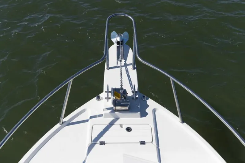 Slide: The Image of Manufacturer Provided Image: Bow of 2022 Parker 2120 Sport Cabin boat with anchor and railing. - 5