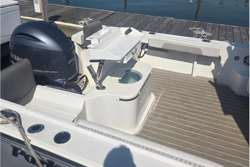 Slide: The Image of Parker 2120 Sport Cabin 2022 with Yamaha engine at dock. - 9
