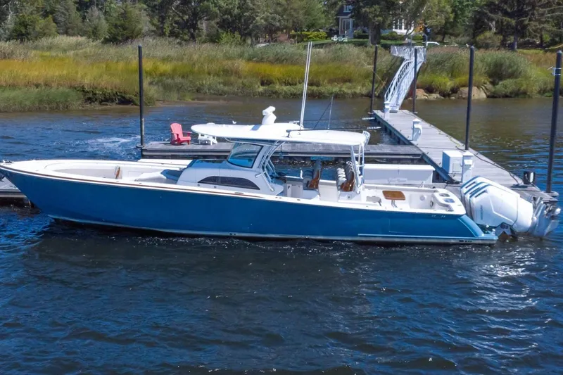 The Image of 2025 Valhalla Boatworks V-46 docked on a sunny day. - 2