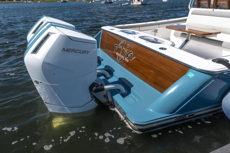 Slide: The Image of 2025 Valhalla Boatworks V-46 with Mercury engines on water, featuring sleek design. - 4