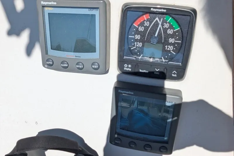 Slide: The Image of Instrumentation panel on a 1990 Catalina 42 sailboat with Raymarine displays. - 12