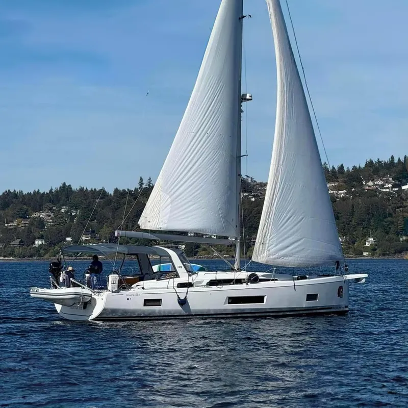 The Image of 2019 Beneteau Oceanis 46.1 sailboat on calm waters. - 0