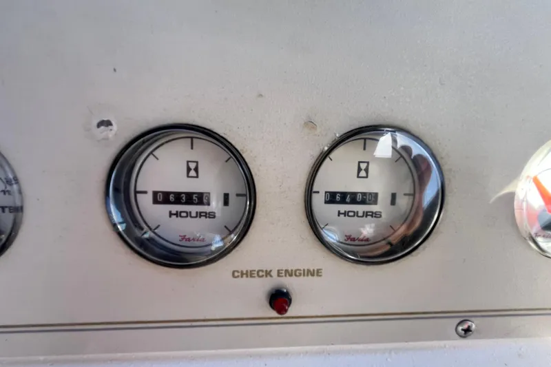 Slide: The Image of 1995 Cruisers Yachts 3650 Motoryacht engine hour meters showing 635.9 and 640.0 hours. - 20