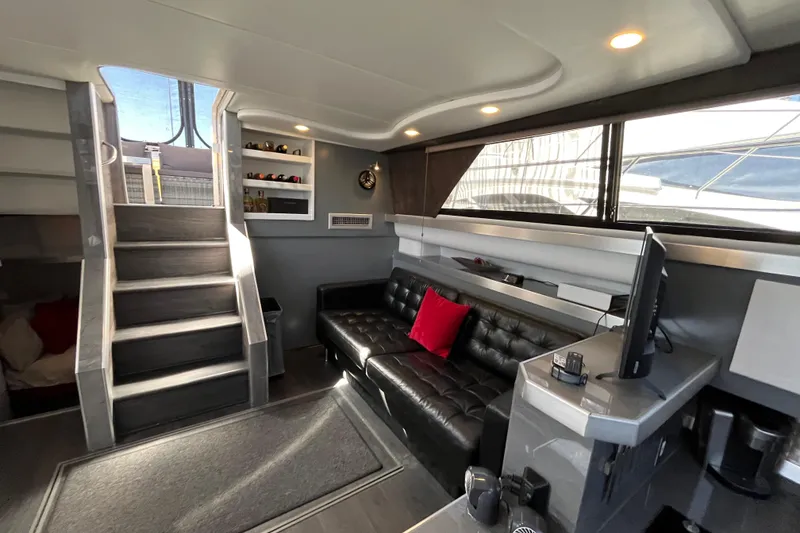 Slide: The Image of Luxurious interior of 1995 Cruisers Yachts 3650 Motoryacht with modern seating and decor. - 26