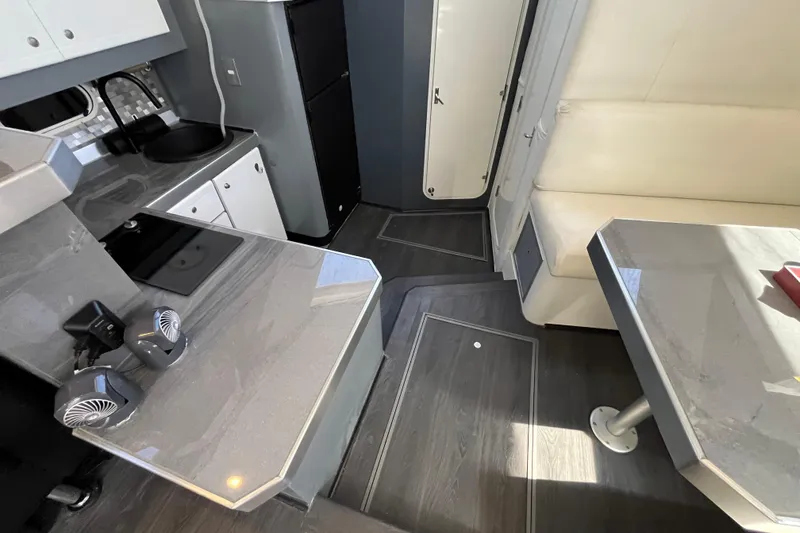 Slide: The Image of Interior of 1995 Cruisers Yachts 3650 Motoryacht with modern kitchen and seating area. - 30