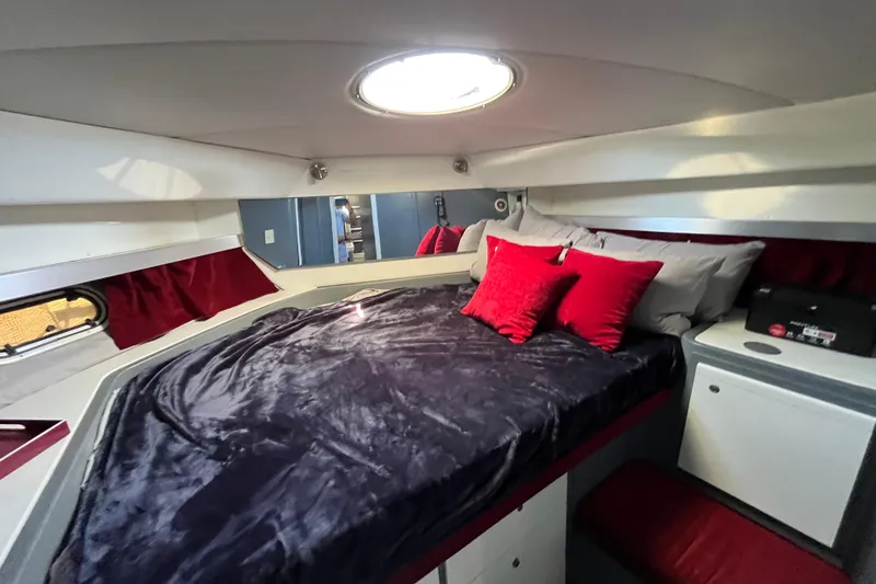 Slide: The Image of Luxurious cabin interior of 1995 Cruisers Yachts 3650 Motoryacht with plush bedding. - 34