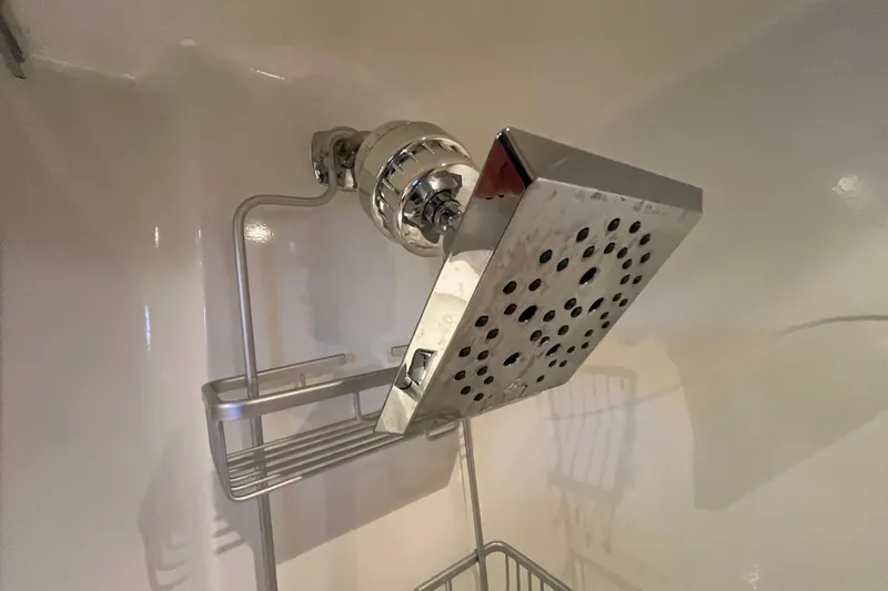 Slide: The Image of Showerhead in 1995 Cruisers Yachts 3650 Motoryacht bathroom, featuring modern chrome design. - 44