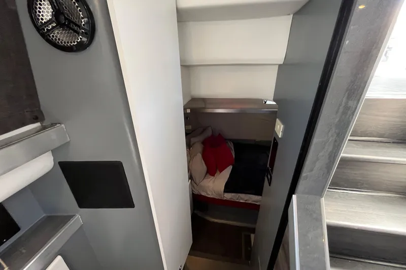 Slide: The Image of Interior cabin view of 1995 Cruisers Yachts 3650 Motoryacht, featuring cozy sleeping area. - 46