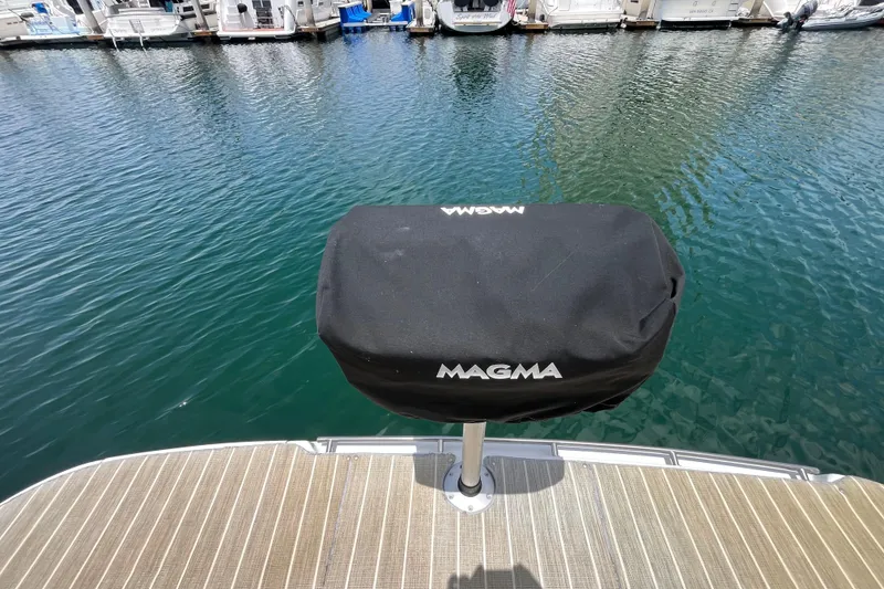 Slide: The Image of Covered grill on 1995 Cruisers Yachts 3650 Motoryacht, docked by the marina. - 9