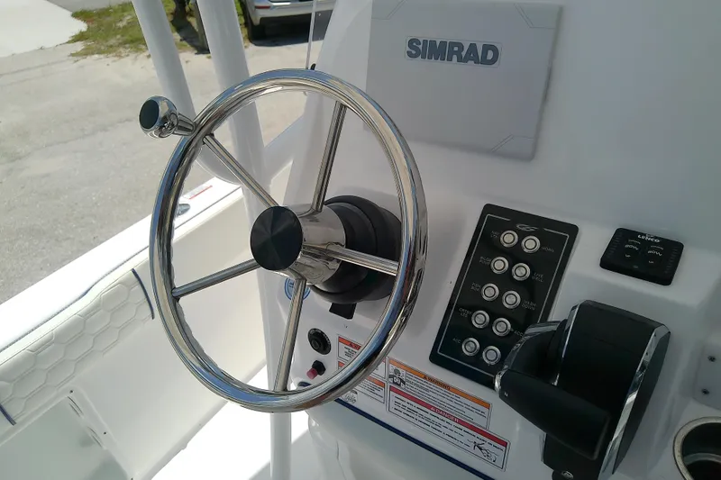Slide: The Image of Steering console of 2025 Glasstream 240 CCX boat with Simrad electronics. - 20