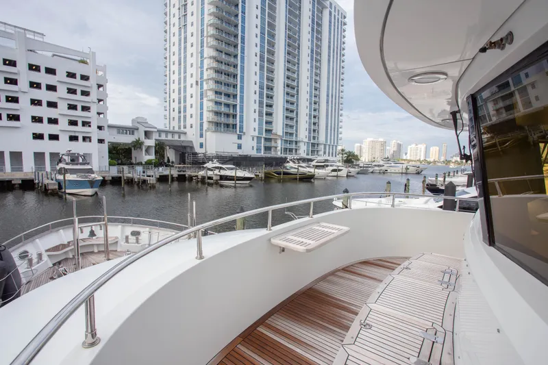 Slide: The Image of Luxurious 2014 Fifth Ocean Yachts 24m Explorer Yacht docked in urban marina setting. - 12