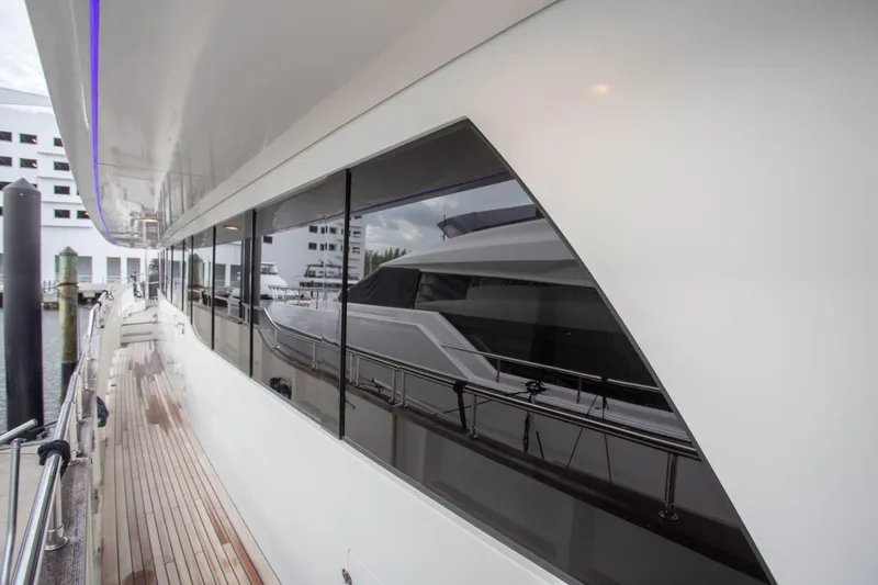 Slide: The Image of Side view of 2014 Fifth Ocean Yachts 24m Displacement Explorer Yacht docked. - 17