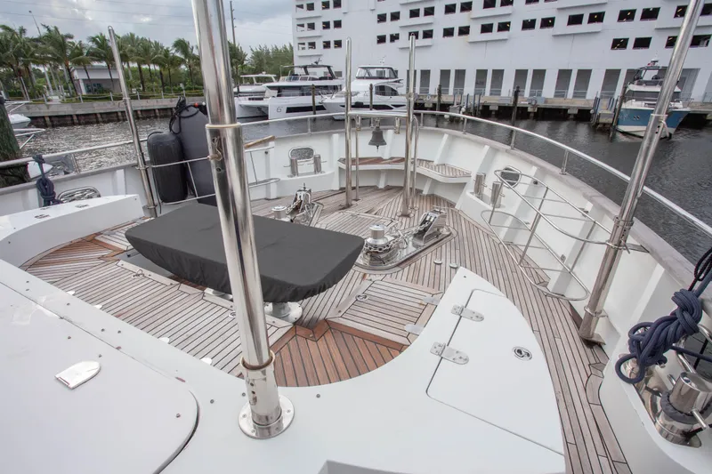 Slide: The Image of Deck of 2014 Fifth Ocean Yachts 24m Displacement Explorer Yacht, featuring teak flooring and mooring equipment. - 20